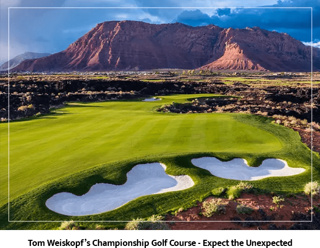 A golf course with mountains in the background.